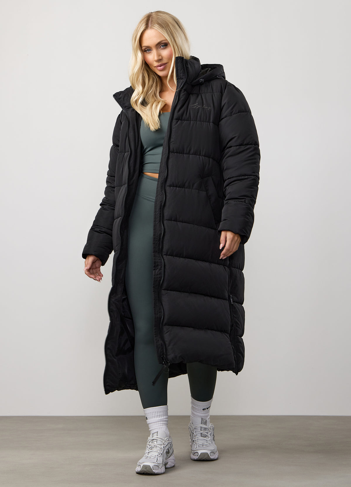 Gym King Longline Puffer Black women’s lightweight quilted jacket with full zip and side pockets