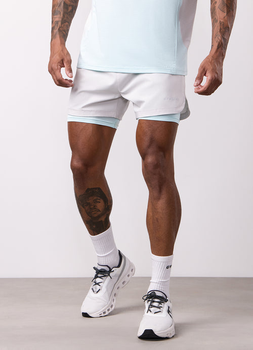 Gym King Progress 2-in-1 korte broek - Lichtgrijs/IJsblauw